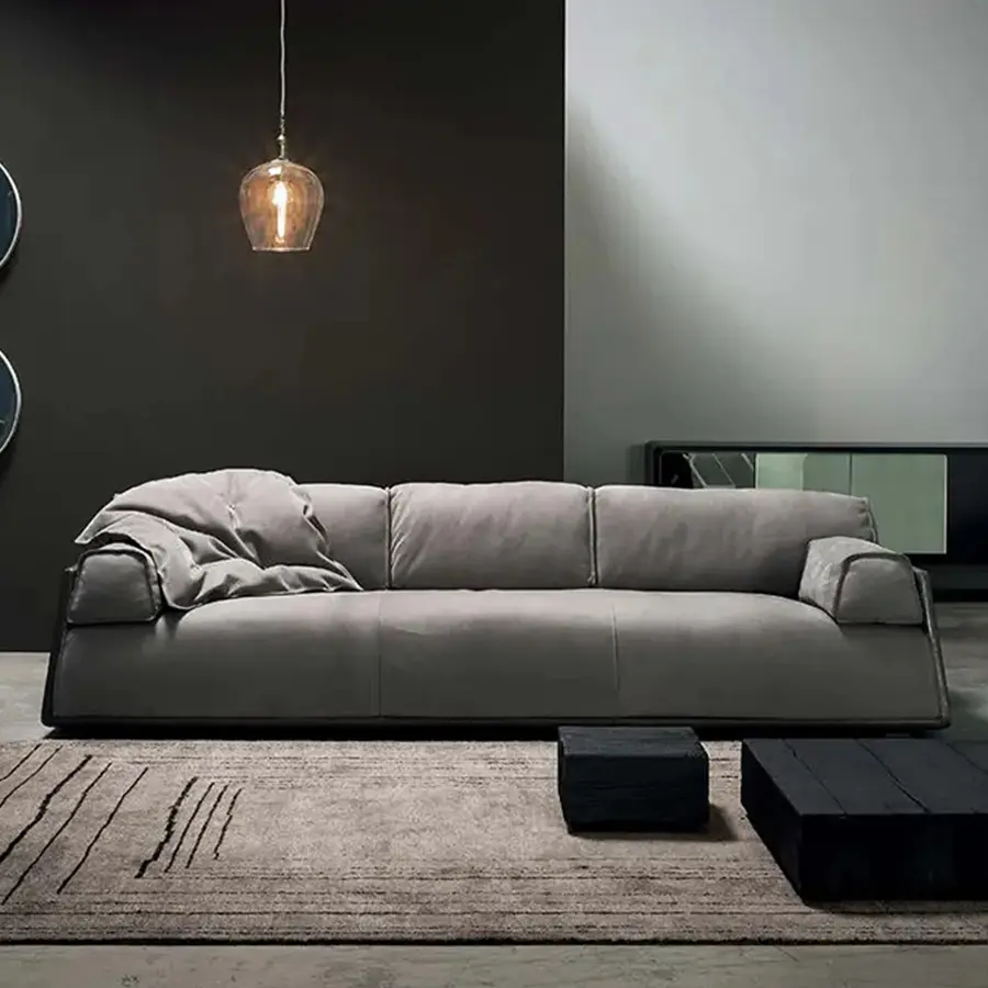 Sofá moderno gris ZD S042 en ambiente de sala de estar.