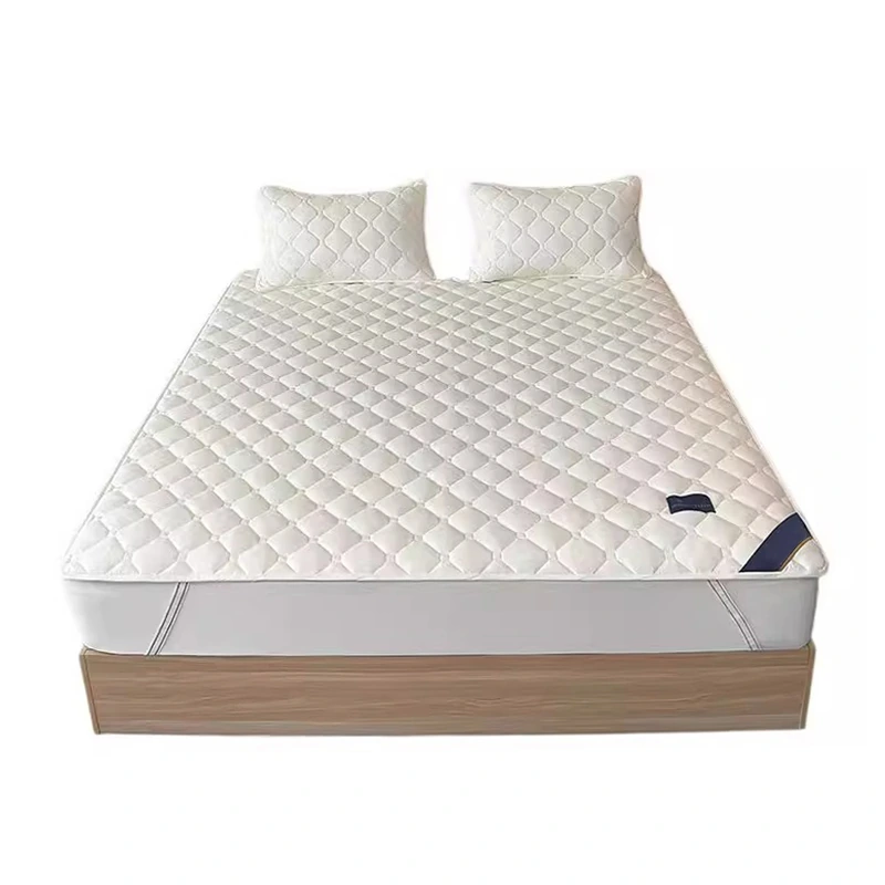 Cubrecolchón acolchado con almohadas