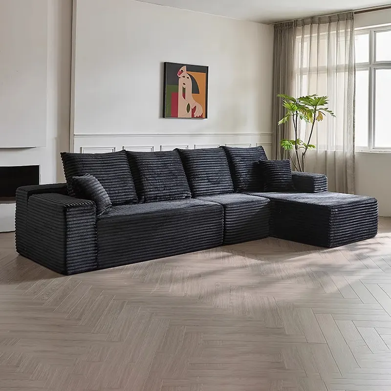 Sofá seccional comprimido de terciopelo capitoné con chaise longue