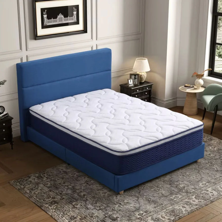 Diseño de cama de muelles tapizada en azul