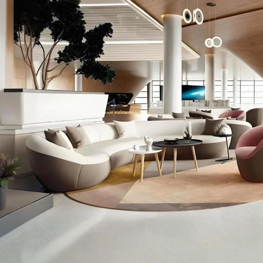 Sofá de lujo tapizado en suave material para interiores de hoteles.