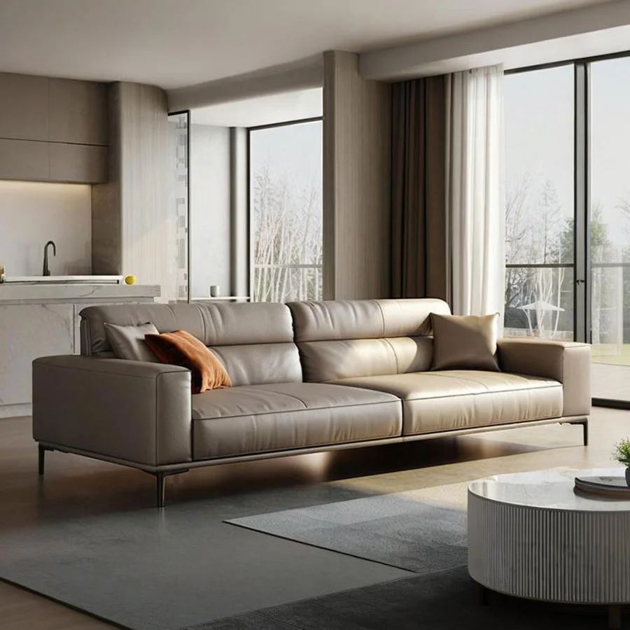 Sofá seccional moderno de color gris para vestíbulos de hotel.
