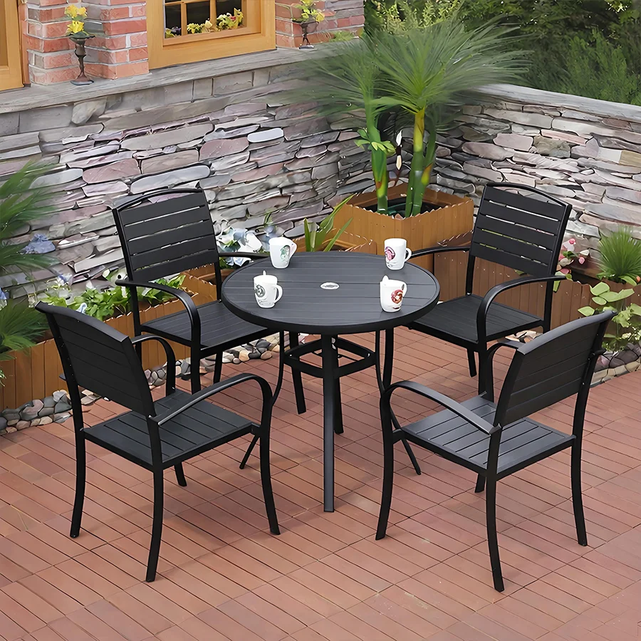 Conjunto de comedor negro para exteriores, ideal para el patio.