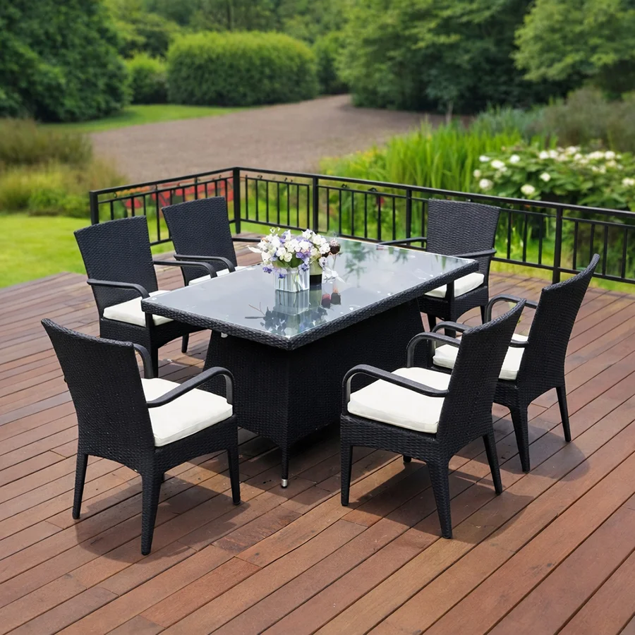 Conjunto de comedor de exterior de mimbre con cojines