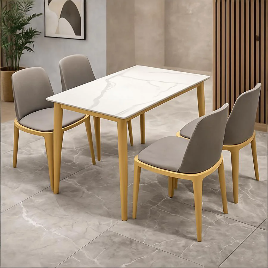Mesa contemporánea de mármol blanco con sillas amarillas.