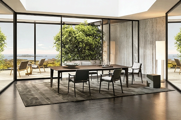 Comedor contemporáneo con diseño de pared de vidrio