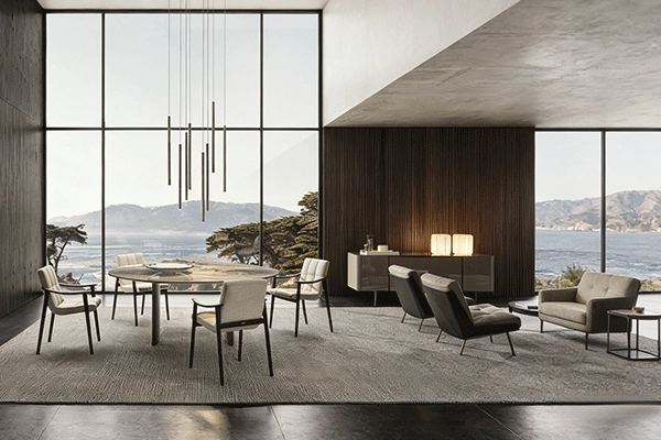 Comedor moderno con vistas panorámicas al océano.