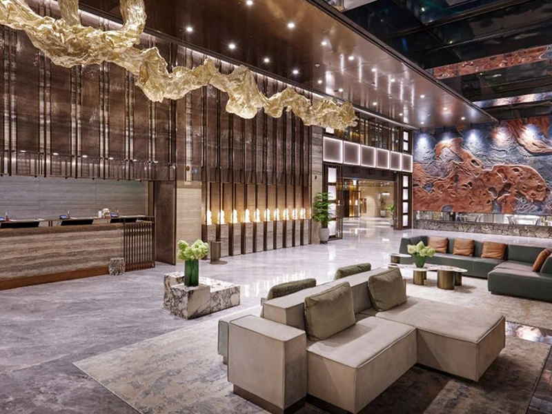 Mobiliario de vestíbulo y zona de recepción de hotel de lujo.